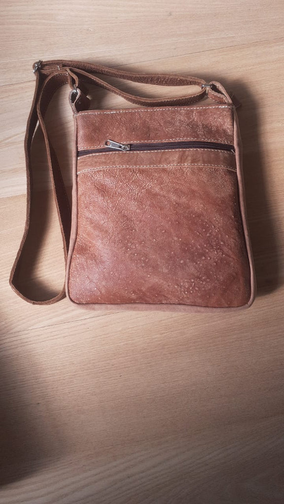 Leather sling sales bags for ladies